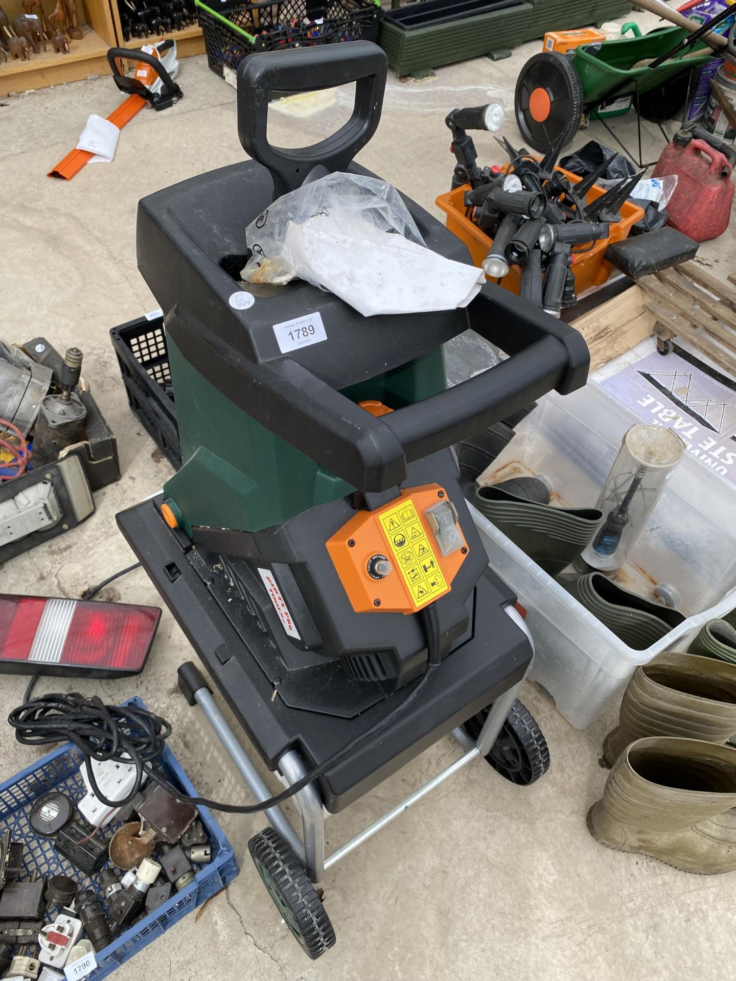 AN ELECTRIC GARDEN SHREDDER