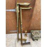 TWO BRASS FIRE FENDERS AND A BRASS FIRE SIDE COMPANION SET