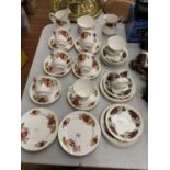 A QUANTITY OF TEAWARE TO INCLUDE ROYAL IMPERIAL CUPS, SAUCERS AND CREAM JUG, PLUS COUNTRY ROSE STYLE