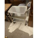 A 1970'S THREE TIER METALWARE TROLLEY WITH THREE DETACHABLE TRAYS