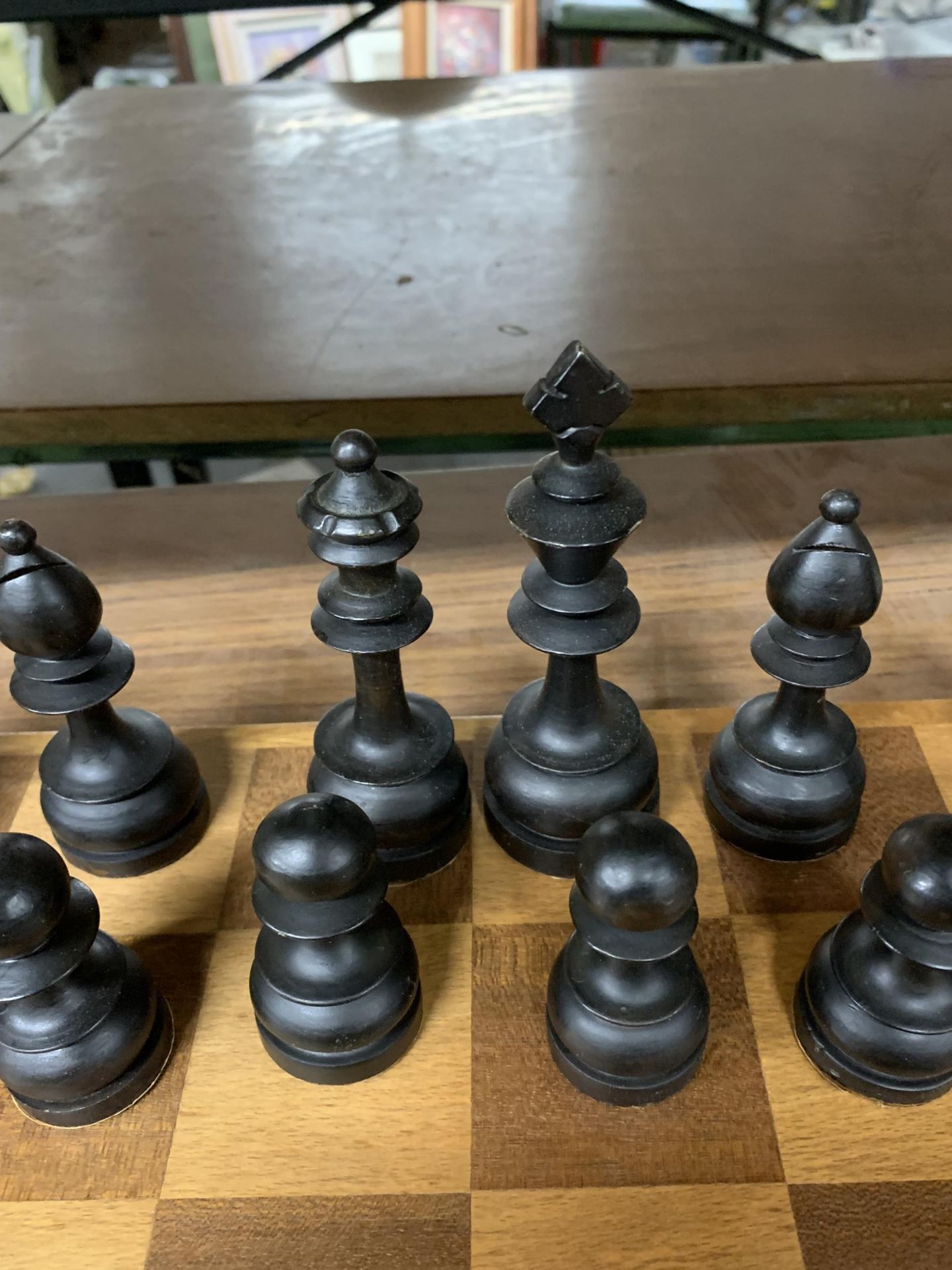 A LARGE WOODEN CHESSBOARD WITH A FULL SET OF WOODEN CHESS PIECES - Image 2 of 4
