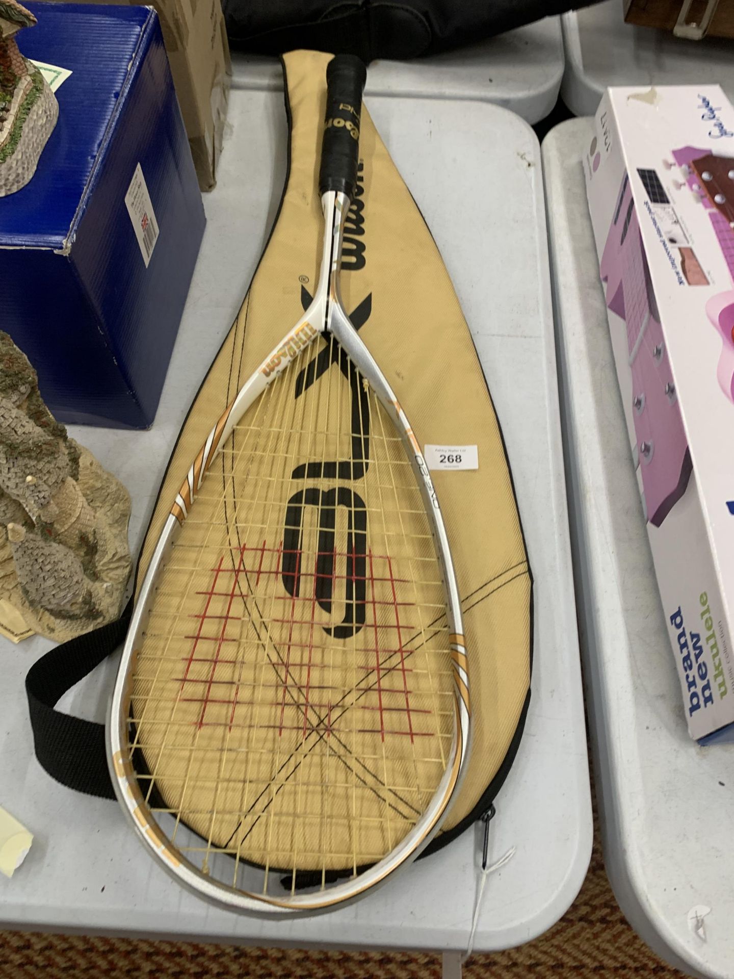 A WILSON HYBRID SPORTS RACKET WITH CASE