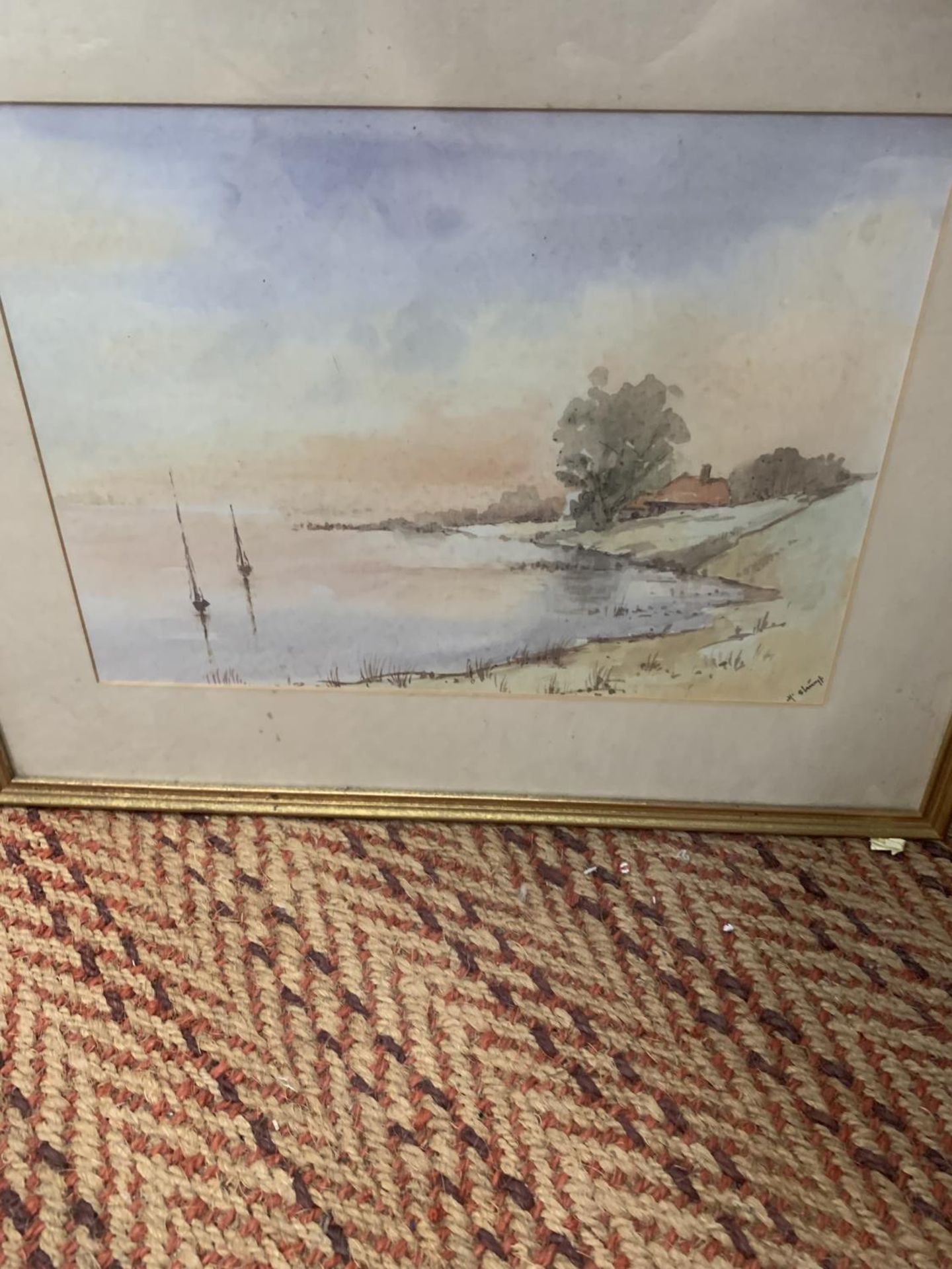 A FRAMED WATERCOLOUR OF A LAKE SCENE WITH INDISTINCT SIGNATURE 54CM X 43CM - Image 2 of 2