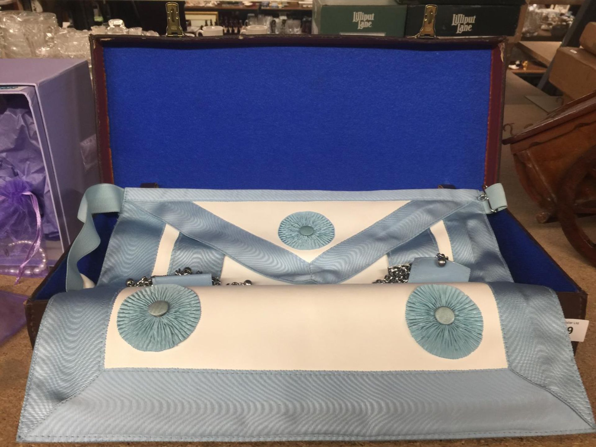 A MASTER MASON'S APRON WITH EMULATION RITUAL BOOK, TIE AND GLOVES TOGETHER WITH DOCUMENTATION FROM