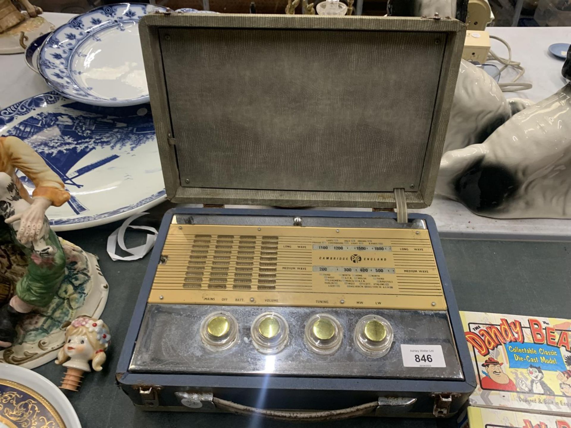 A VINTAGE PORTABLE PYE RADIO IN A CASE