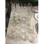 A QUANTITY OF GLASSWARE TO INCLUDE WINE GLASSES, TUMBLERS, SHOT GLASSES, ETC.,
