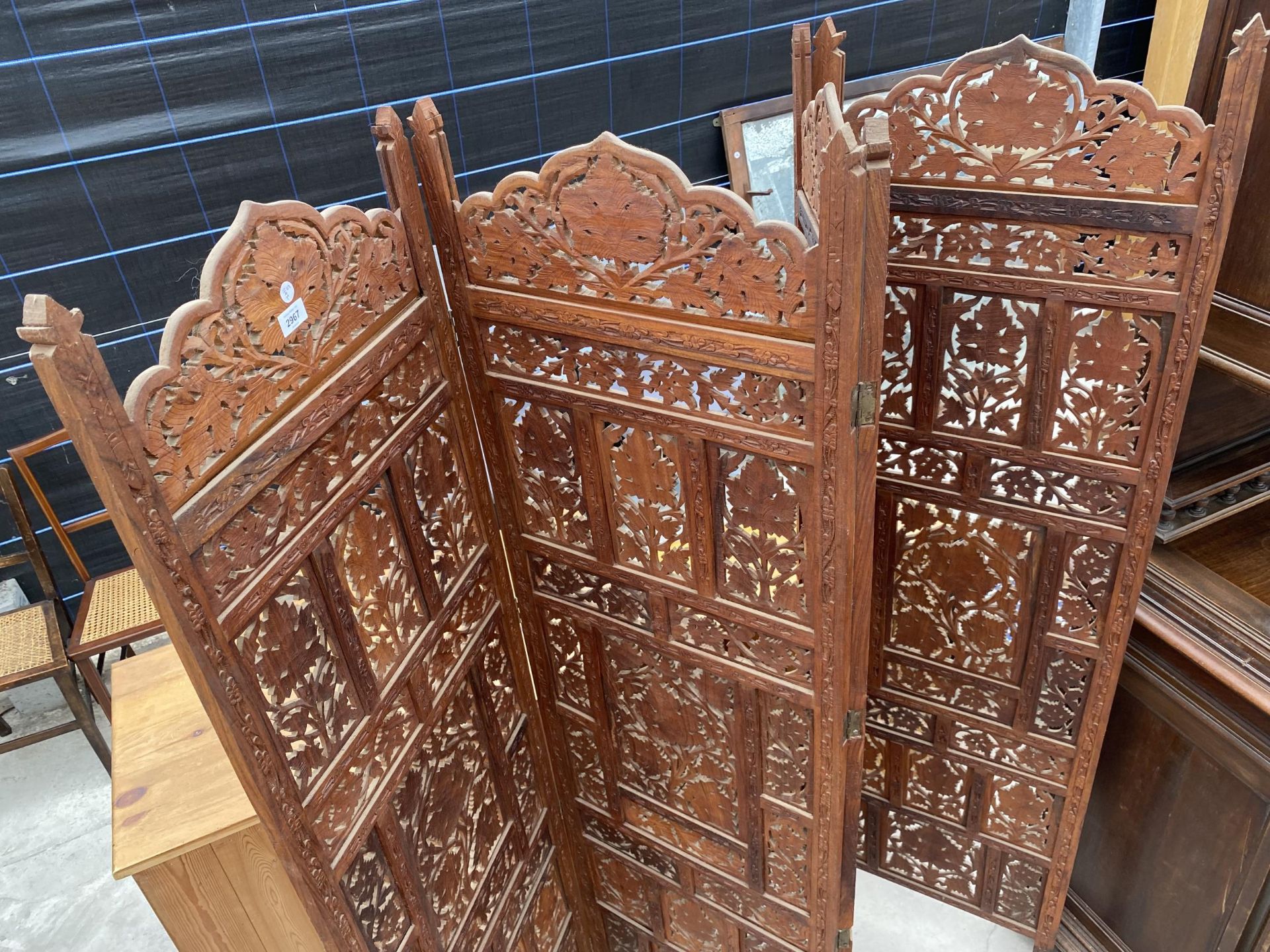 A PROFUSELY CARVED HARDWOOD MOROCCAN DIVISION SCREEN, EACH PANEL, 71" HIGH AND 19.5" WIDE - Image 2 of 3