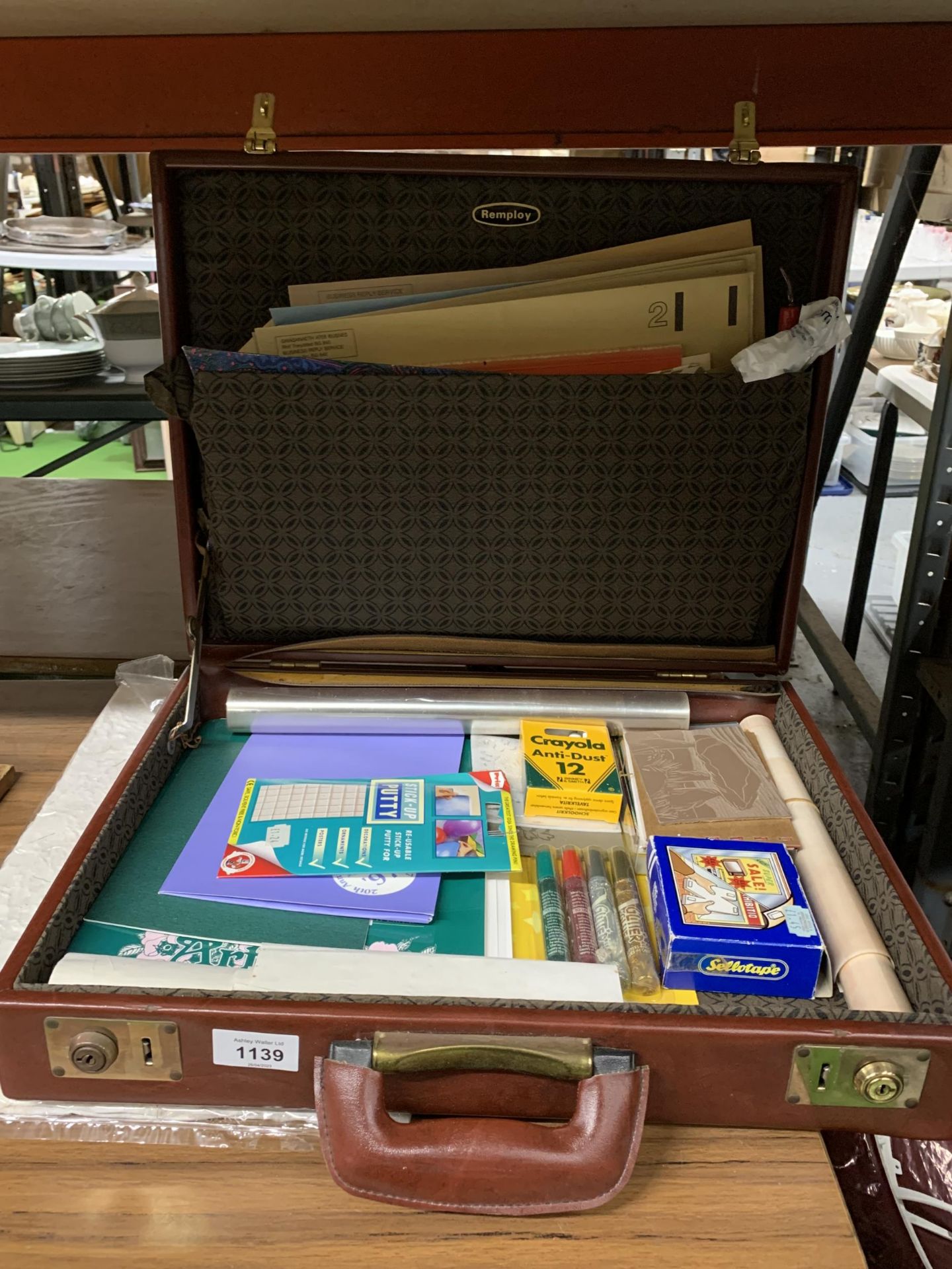 A VINTAGE SUITCASE CONTAINING A QUANTITY OF CRAFT ITEMS