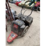 A TROY-BILT PETROL PUSH ALONG TRIMMER/MOWER