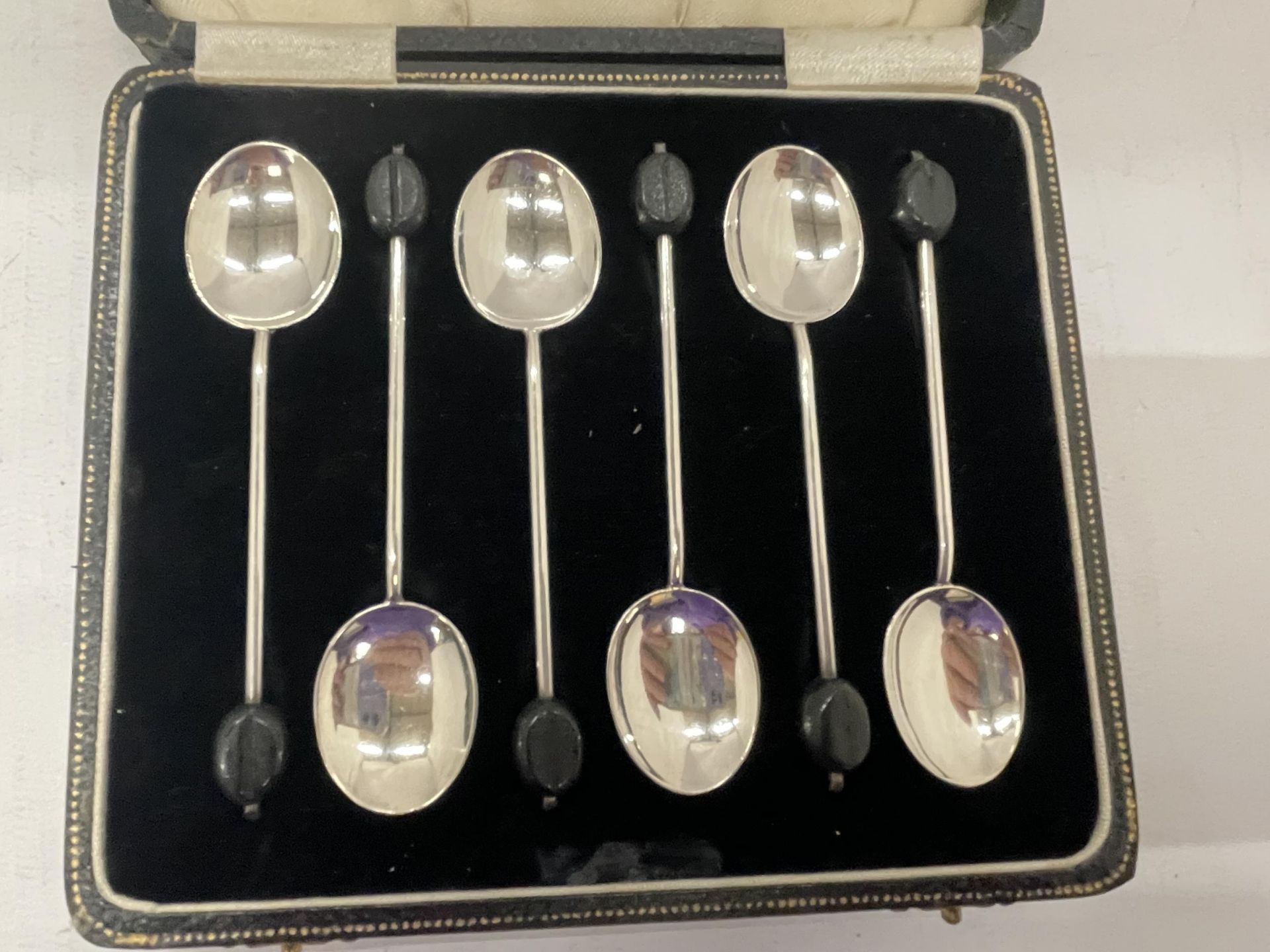 A CASED SET OF SIX HALLMARKED SILVER COFFEE BEAN SPOONS - Image 2 of 4