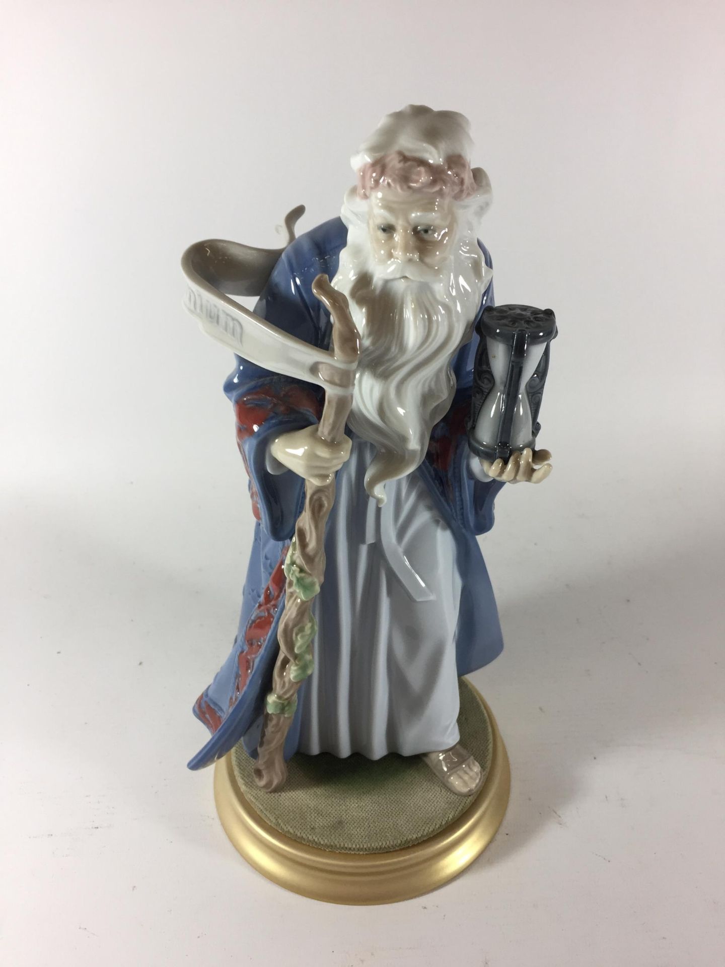 A LLADRO 'FATHER TIME' NO. 6696 FIGURE ON DISPLAY BASE