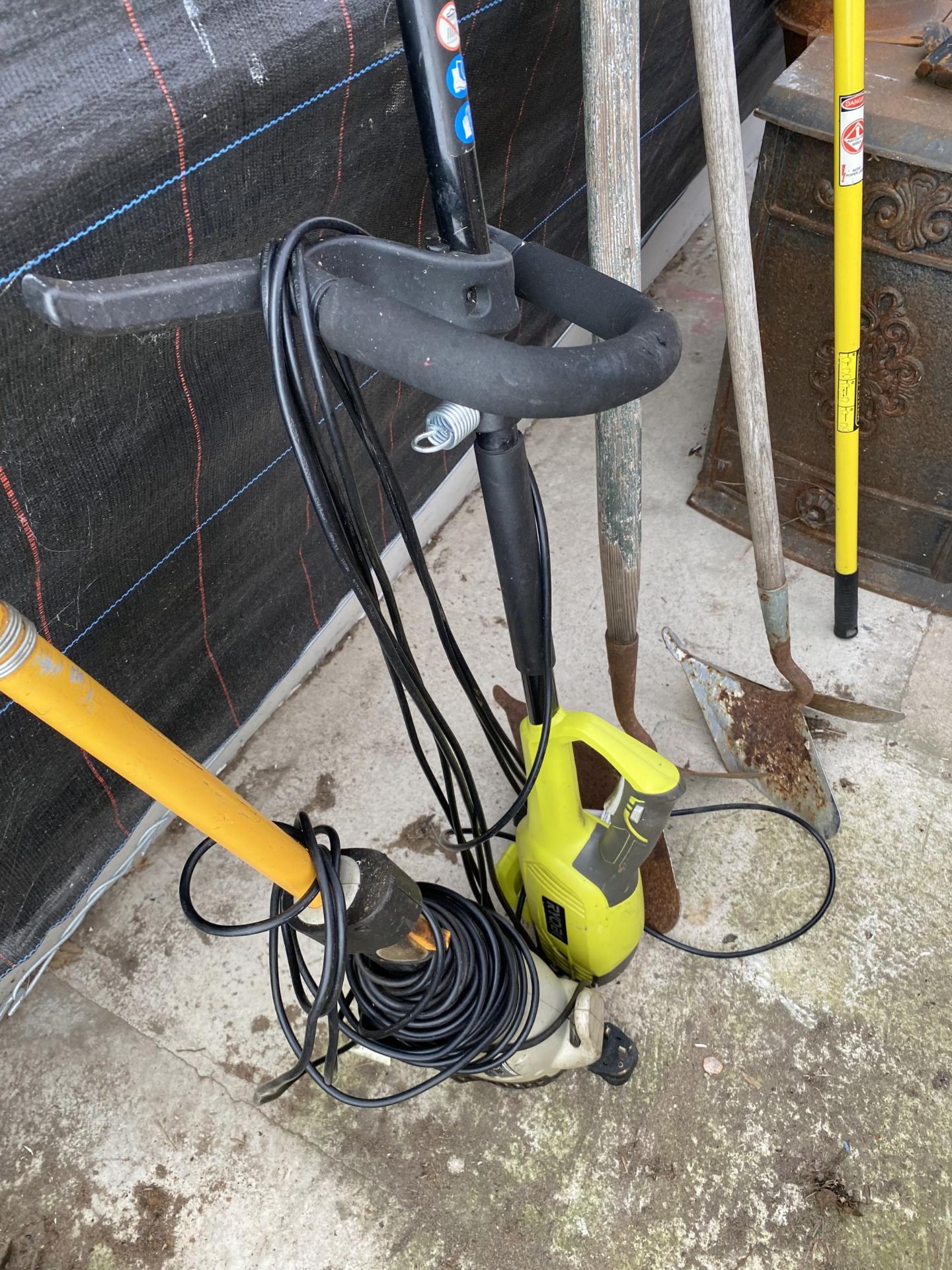 AN ASSORTMENT OF TOOLS TO INCLUDE TWO ELECTRIC STRIMMERS AND TWO HOES ETC - Image 2 of 2