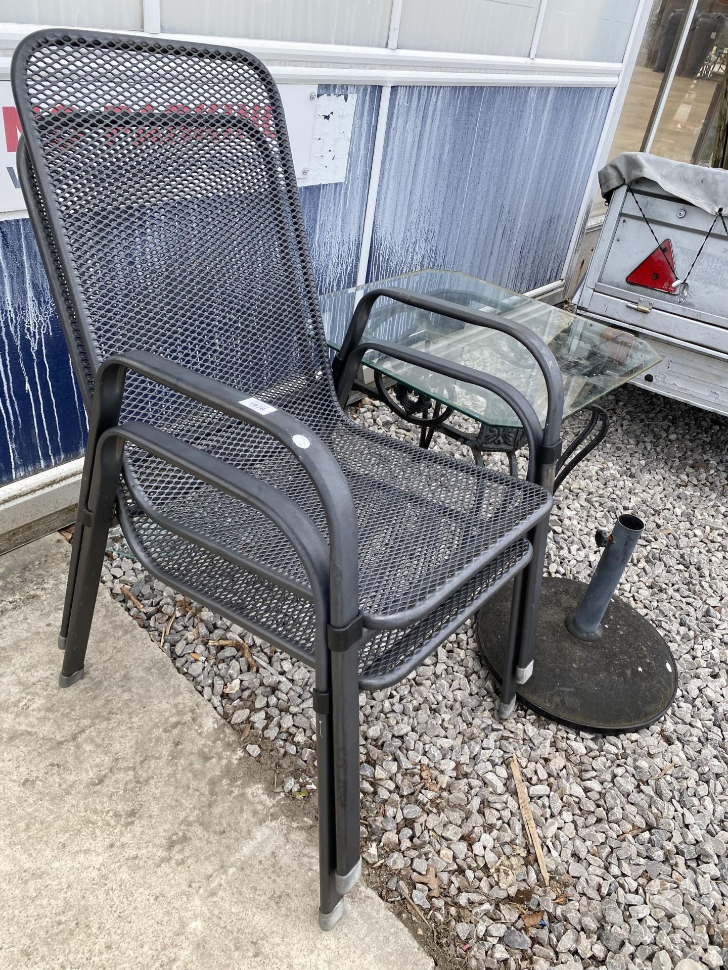 TWO STACKING GARDEN CHAIRS AND A GLASS TOPPED TABLE - Image 2 of 3