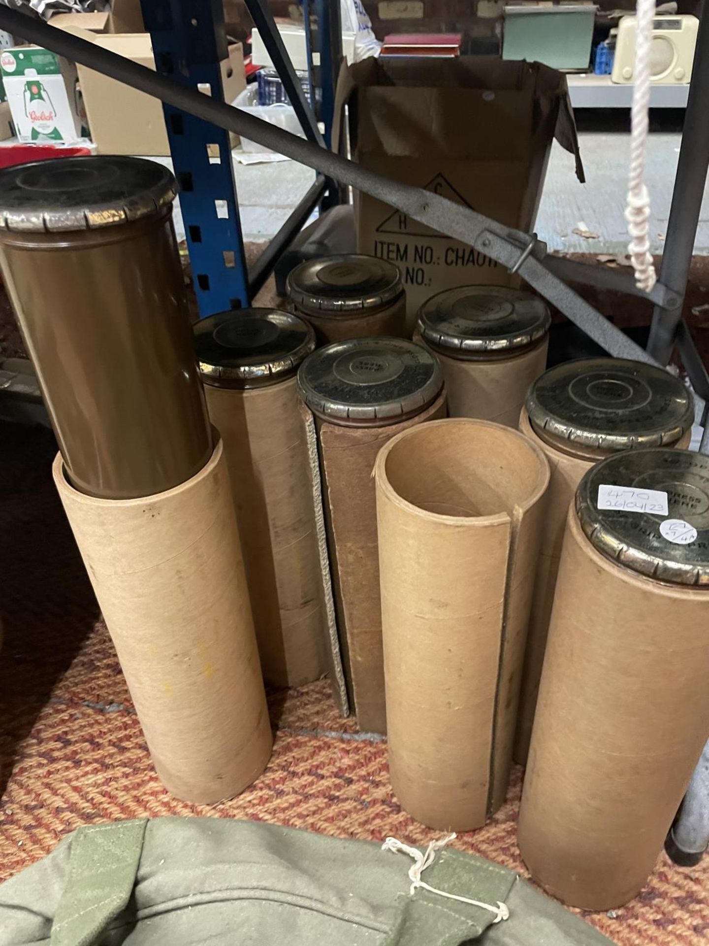 SEVEN DOCUMENT CANISTERS WITH CARDBOARD CASES