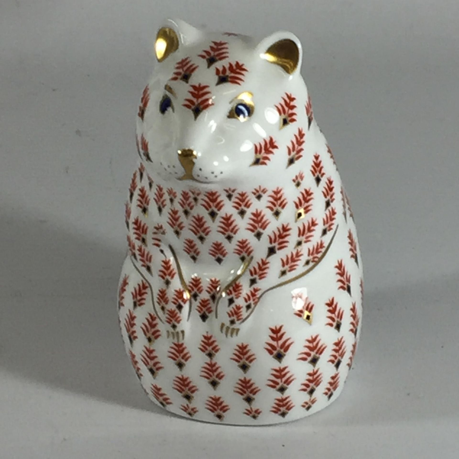 A ROYAL CROWN DERBY HAMSTER PAPERWEIGHT WITH GOLD STOPPER