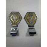 TWO VINTAGE AA BUMPER BAR BADGES NOS. V180321 AND V269395 WITH CLIPS