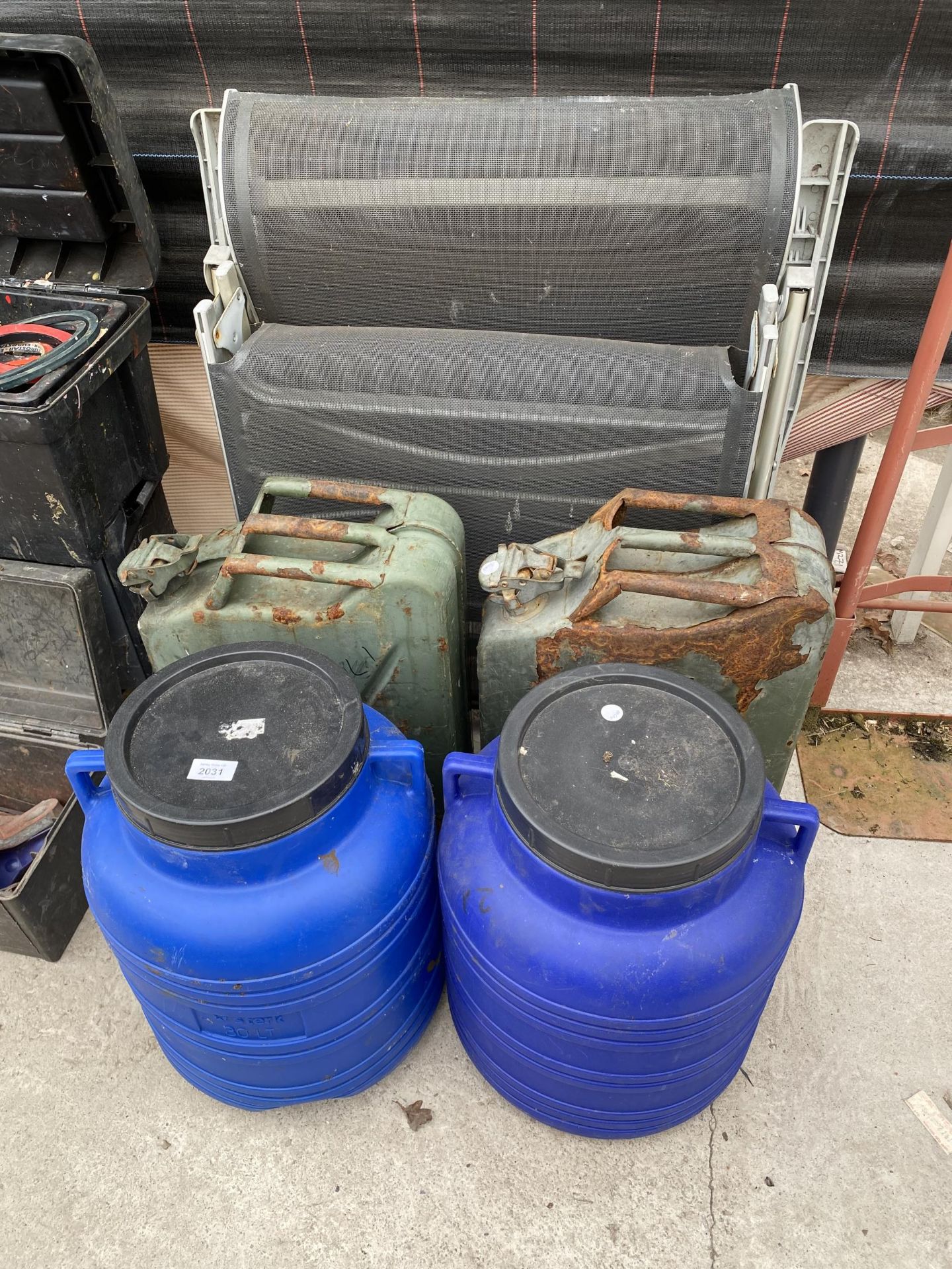 A FOLDING CHAIR, TWO JERRY CANS AND TWO PLASTIC DRUMS ETC