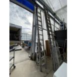 A 22 RUNG ALUMINIUM TWO SECTION EXTENDABLE LADDER AND A FURTHER STEP LADDER