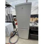 A WHITE ELECTROLUX UPRIGHT FRIDGE FREEZER