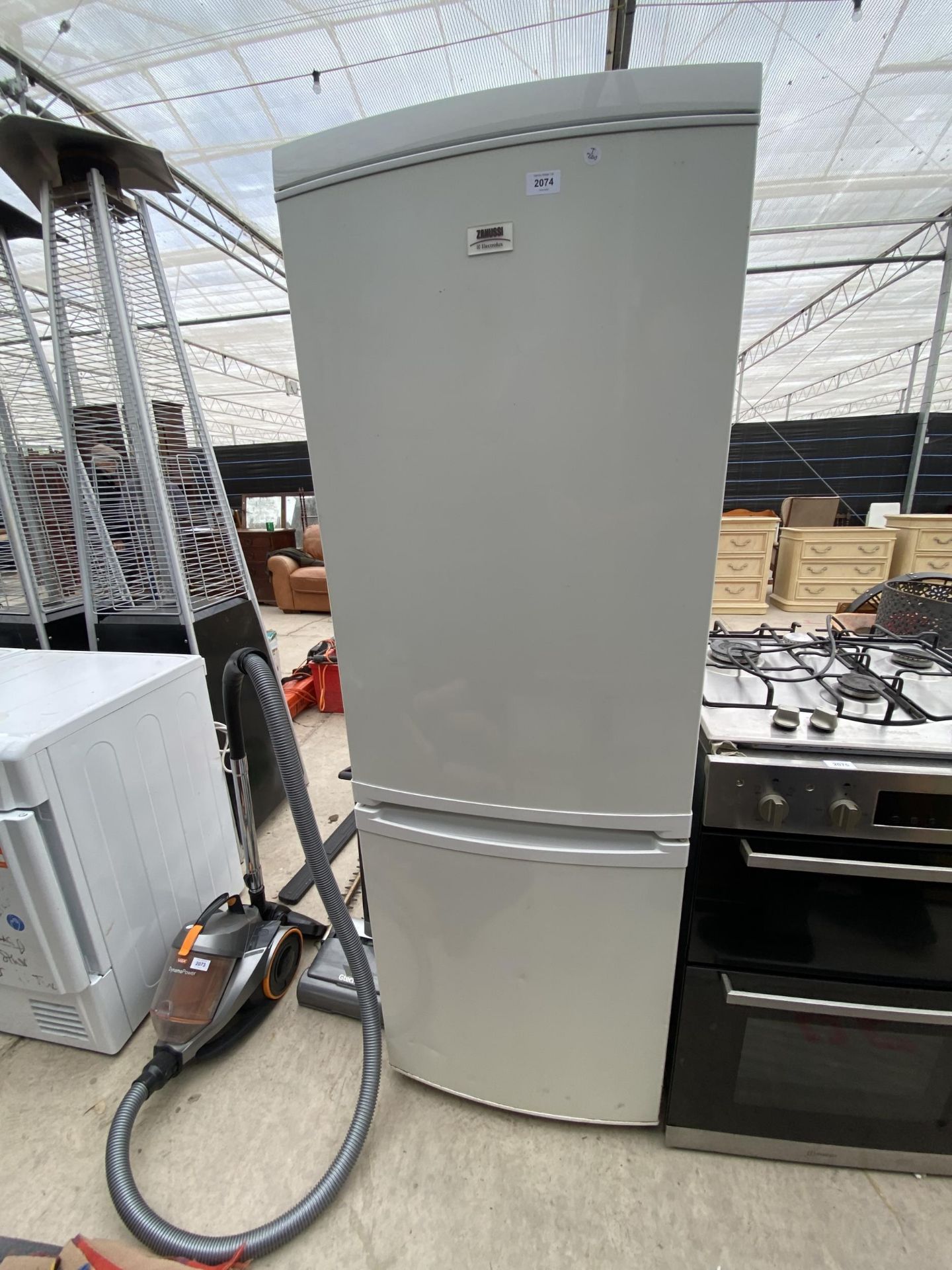 A WHITE ELECTROLUX UPRIGHT FRIDGE FREEZER