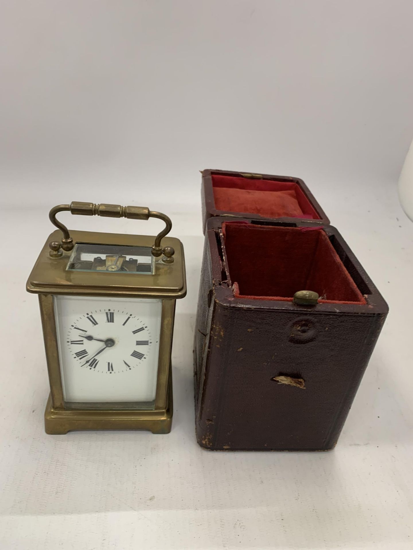 A FRENCH BRASS CASED CARRIAGE CLOCK IN ORIGINAL OUTER CASE WITH KEY