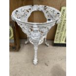 A VINTAGE CAST IRON CIRCULAR TABLE BASE