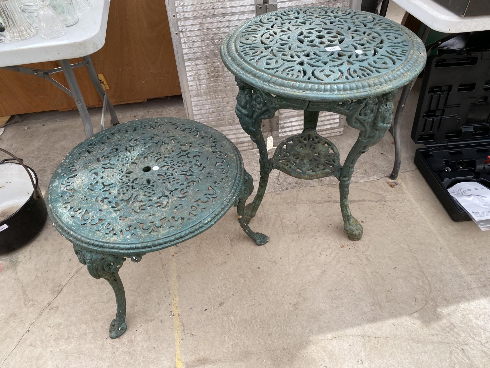 A VINTAGE CAST ALLOY PUB TABLE AND A FURTHER CAST ALLOY COFFEE TABLE