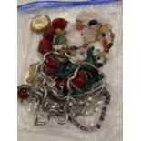 A QUANTITY OF COSTUME JEWELLERY TO INCLUDE NECKLACES, ETC