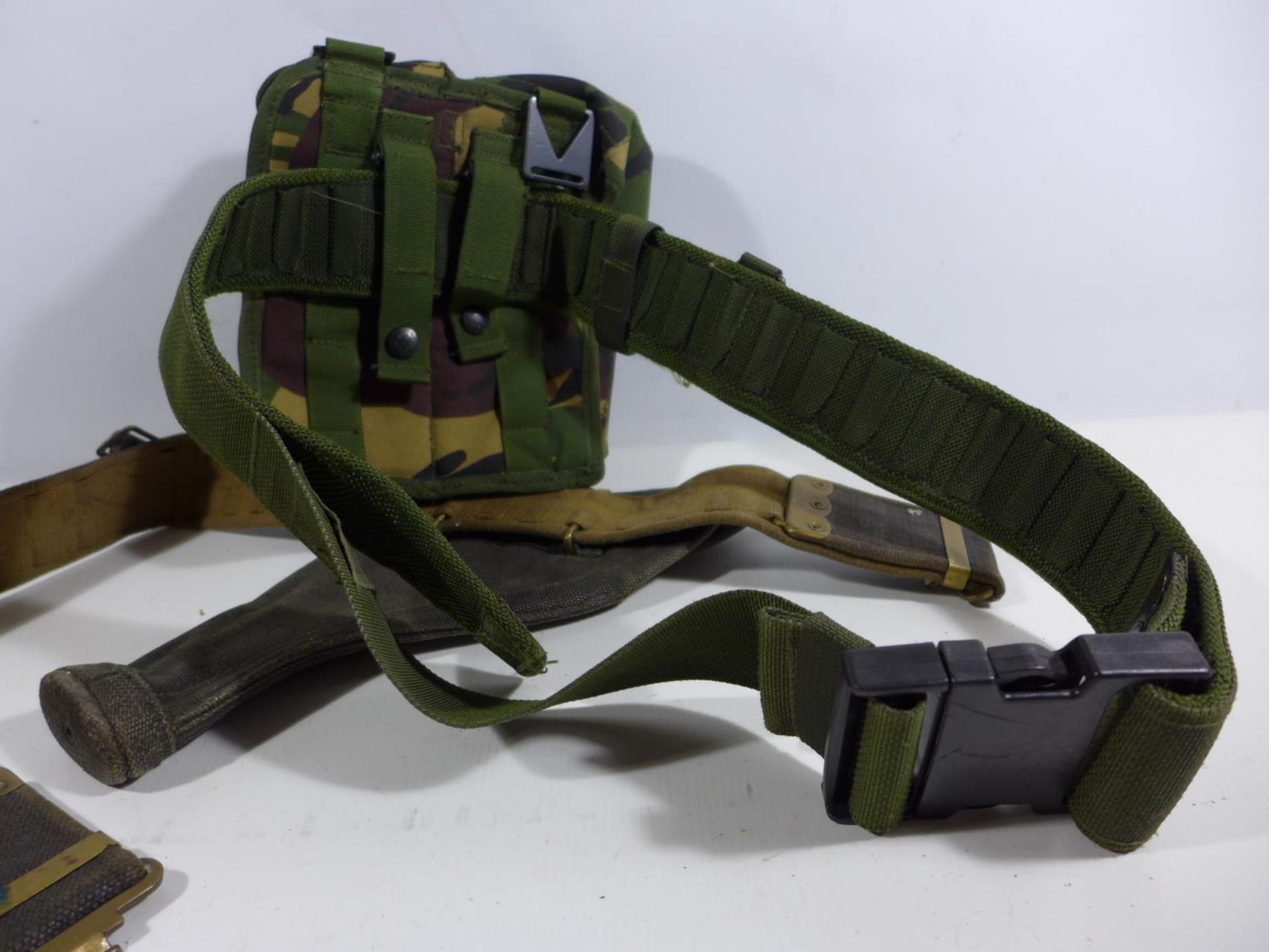 A MILITARY ISSUE CANVAS BELT AND HOLSTER AND A CAMOUFLAGE BELT PACK (2) - Image 4 of 4