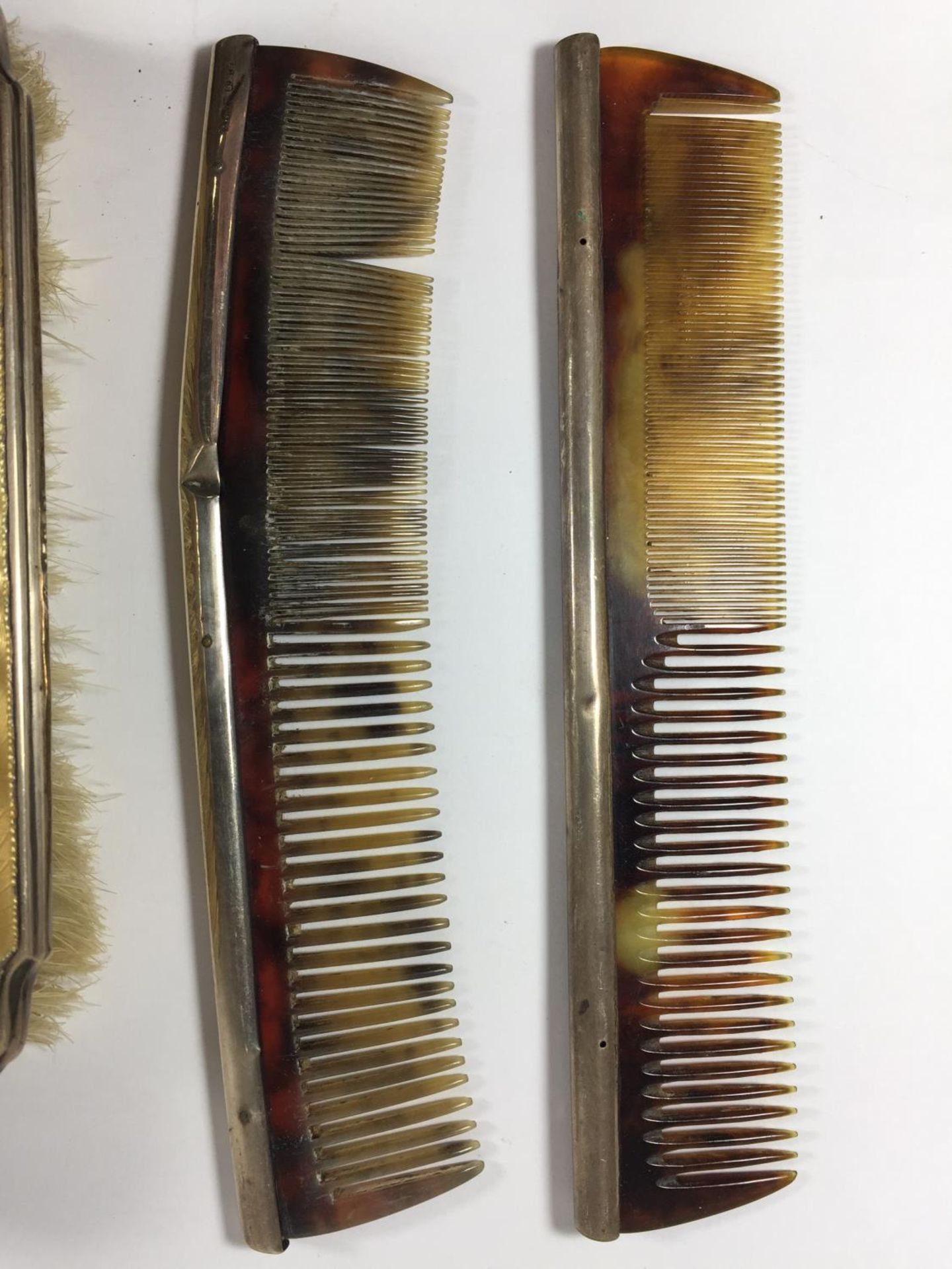 FOUR SILVER ITEMS TO INCLUDE TWO BRUSHES AND TWO COMBS - Image 2 of 5
