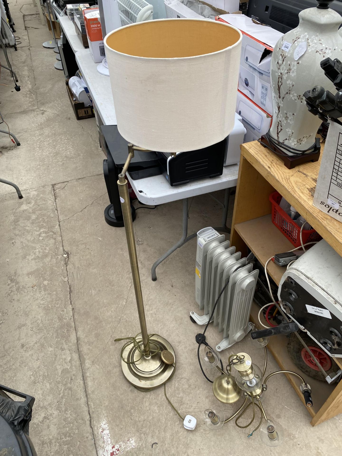 AN ELECTRIC HEATER, A LIGHT FITTING AND A LAMP