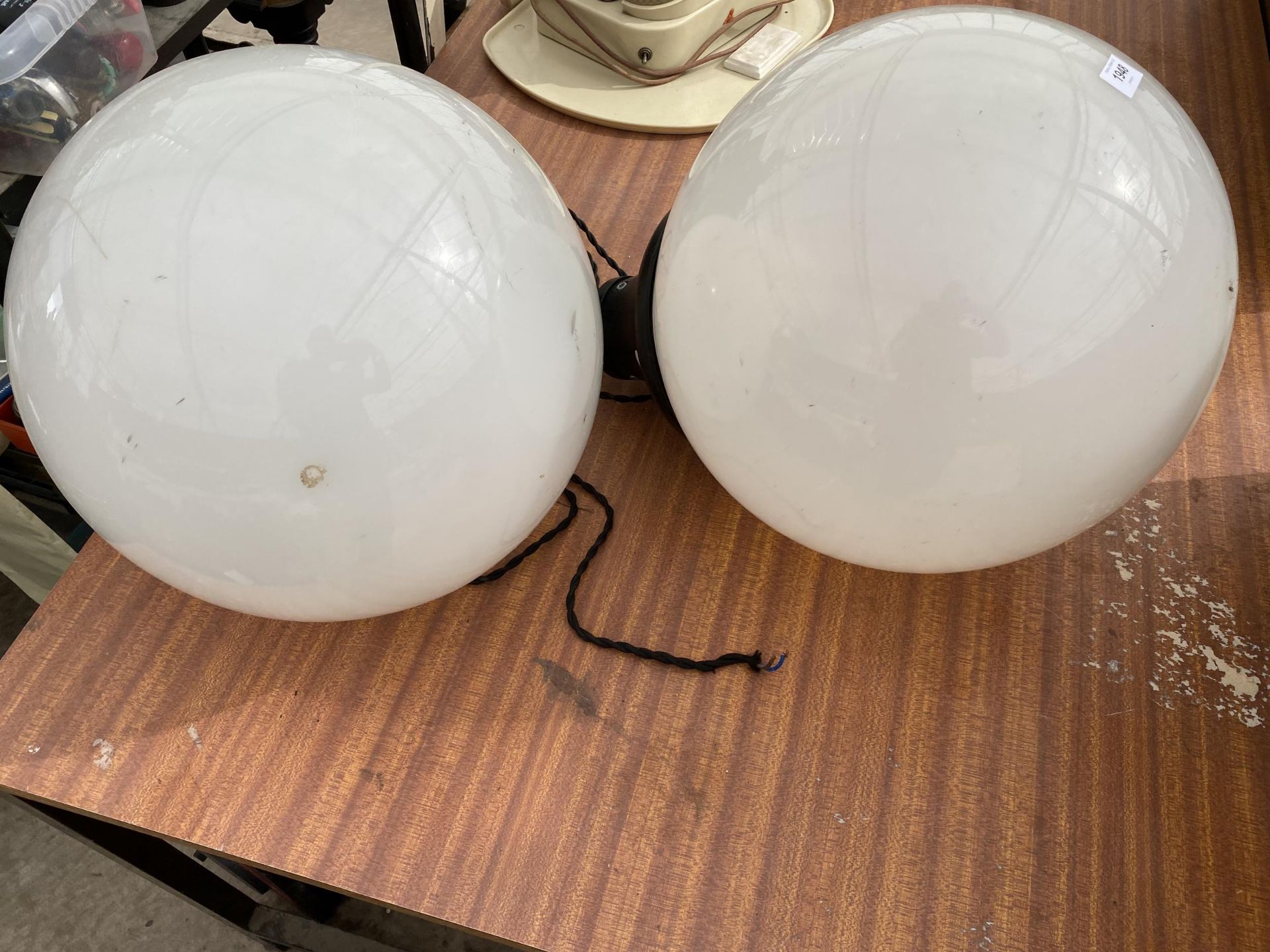 A PAIR OF LARGE RETRO LIGHT FITTINGS