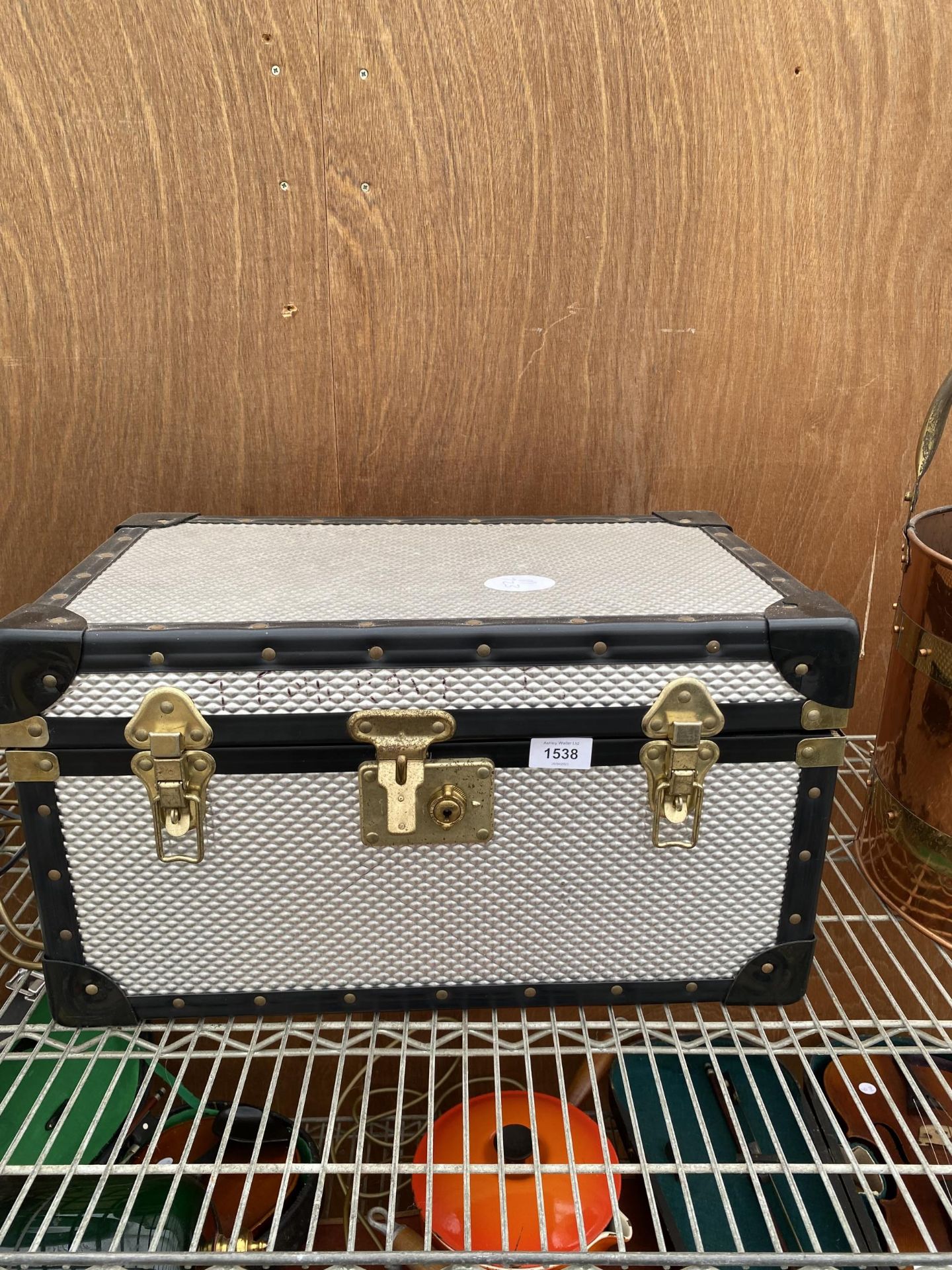 A SMALL HARD CASED TRAVEL CASE