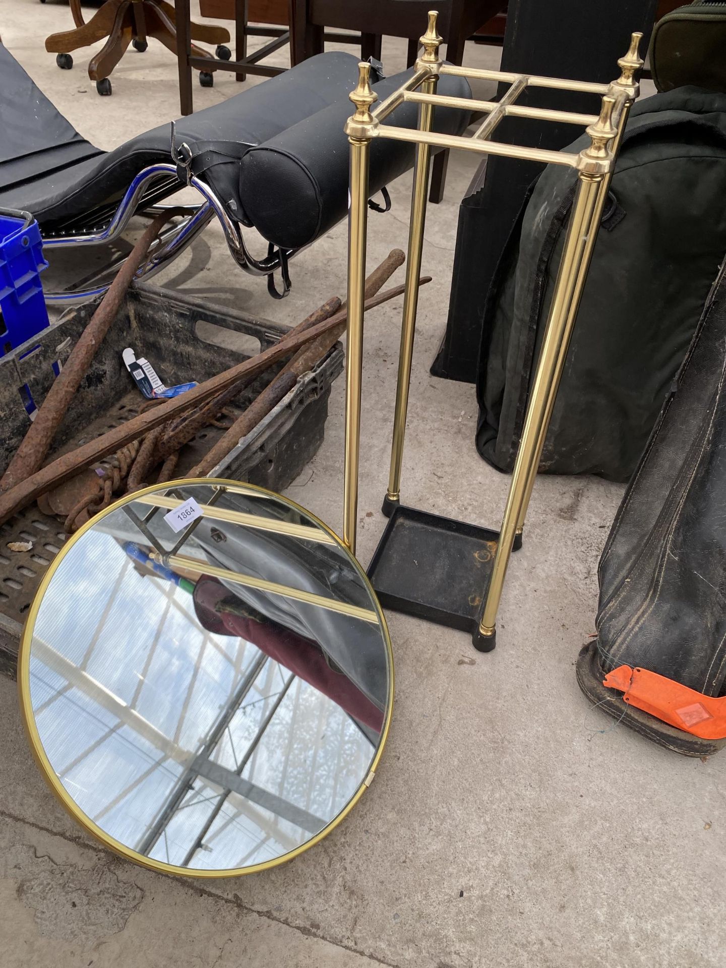 A BRASS STICK STAND AND A SCHREIBER WALL MIRROR