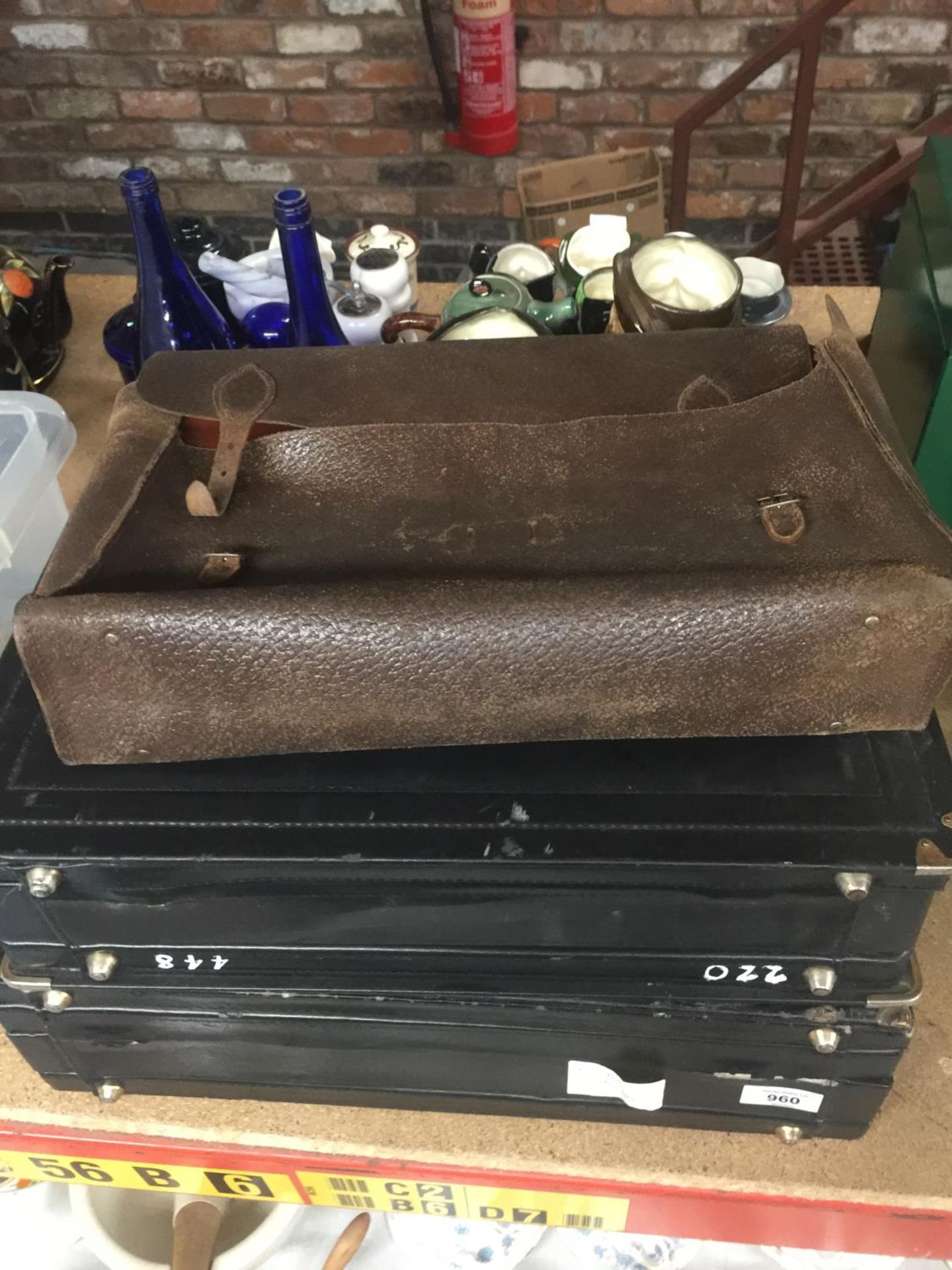 TWO COMBINATION LOCK BRIEFCASES AND A VINTAGE LEATHER SATCHEL