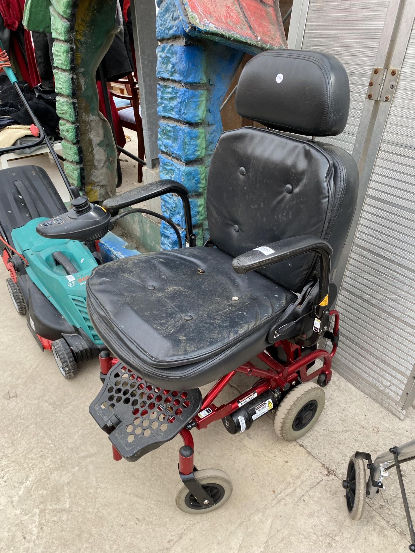 AN ELECTRIC WHEELCHAIR