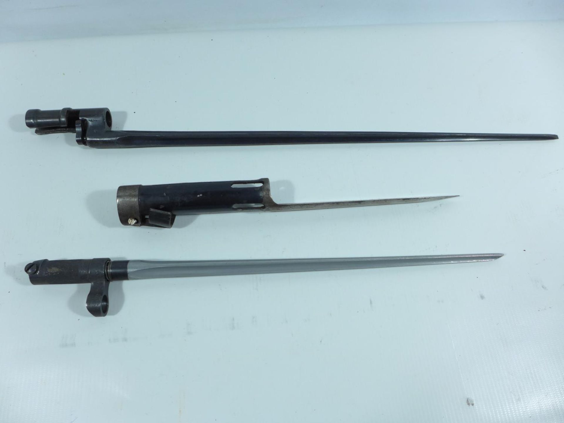 A CHINESE SKS BAYONET, LENGTH 38CM, TWO FURTHER BAYONETS, LENGTHS 28.5CM AND 50CM (3)