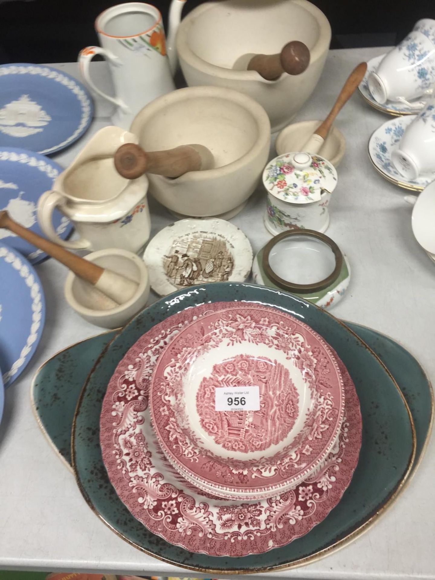 TWO LARGE AND TWO SMALL PESTLE AND MORTARS PLUS VINTAGE JUGS, BOWLS, PLATES, ETC