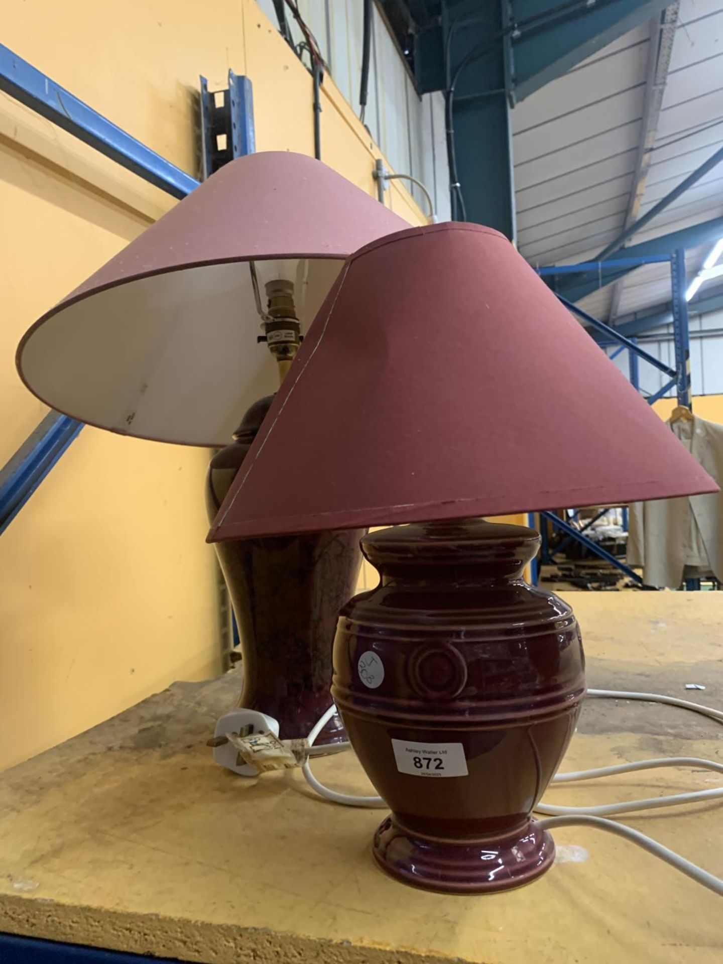 TWO BURGUNDY CERAMIC TABLE LAMPS WITH SHADES
