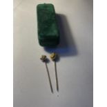 TWO 9 CARAT GOLD STICK PINS GROSS WEIGHT 2.43 GRAMS IN A VINTAGE PRESENTATION CASE