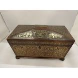 A 19TH CENTURY ROSEWOOD AND BRASS INLAID SARCOPHAGUS SHAPED TEA CADDY WITH TWO INNER LIDDED