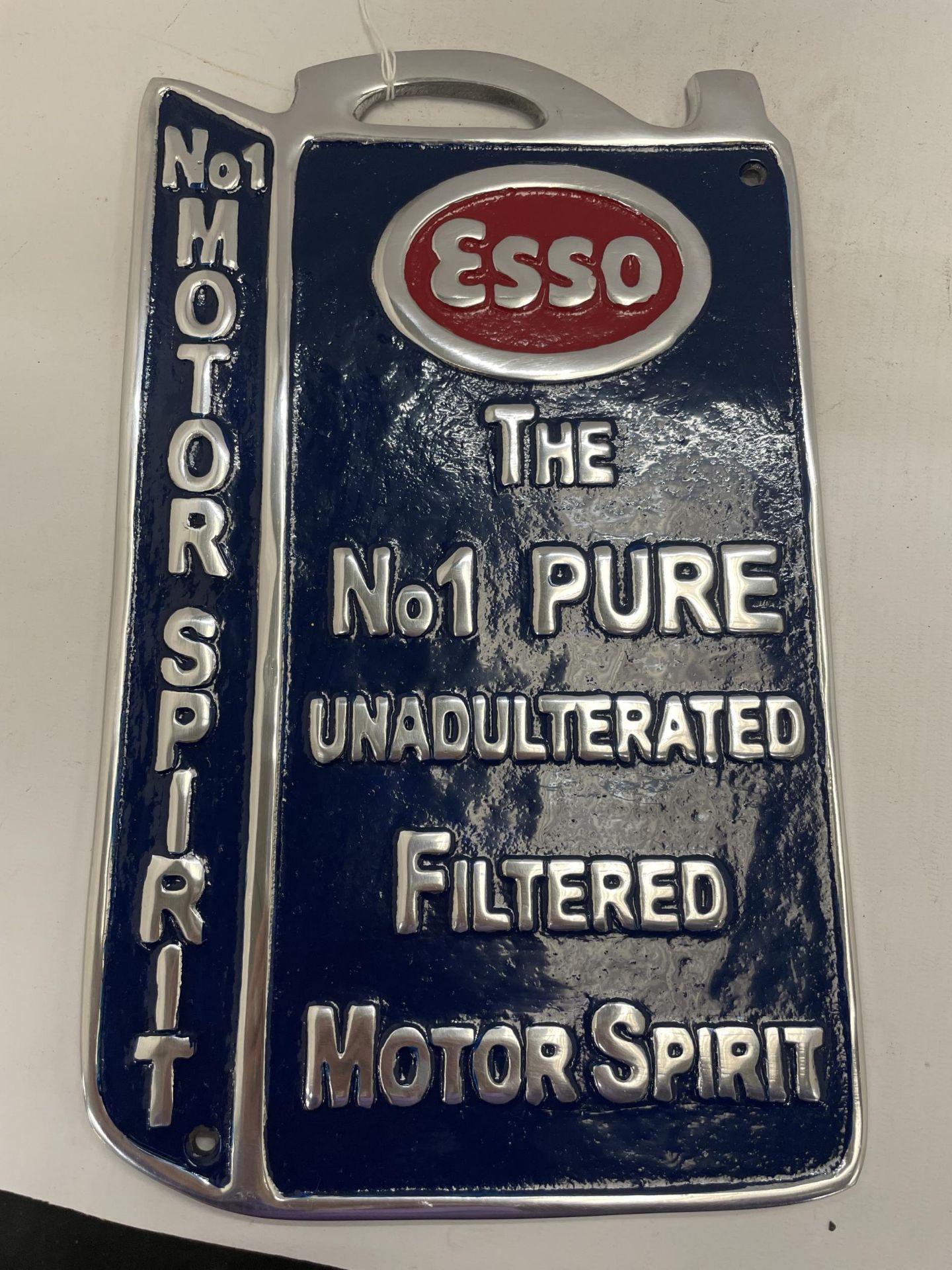 A CHROME ESSO MOTOR SPIRIT SIGN