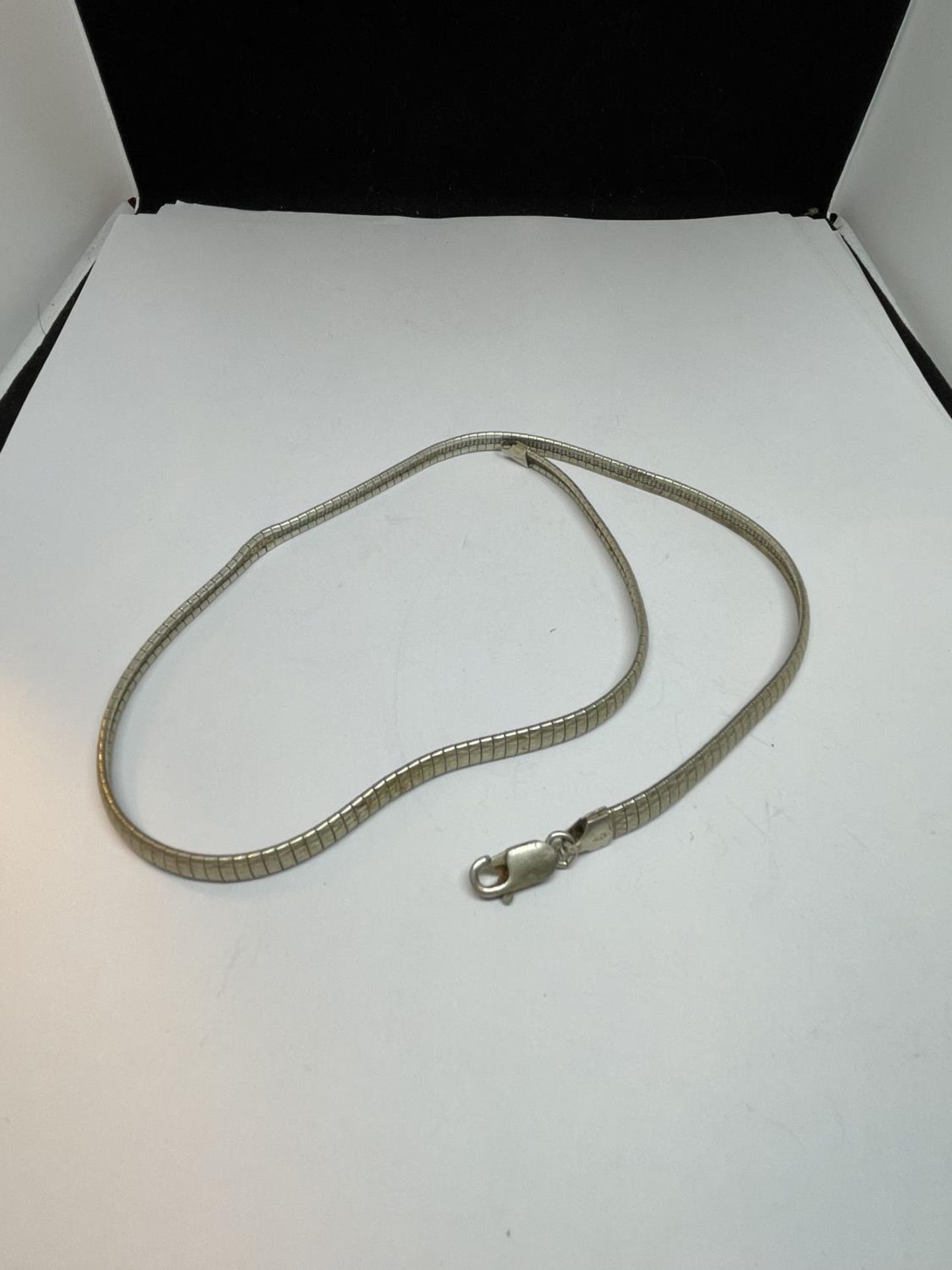 A SILVER NECKLACE