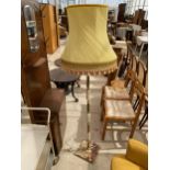 A 20TH CENTURY ONYX AND BRASS STANDARD LAMP COMPLETE WITH SHADE