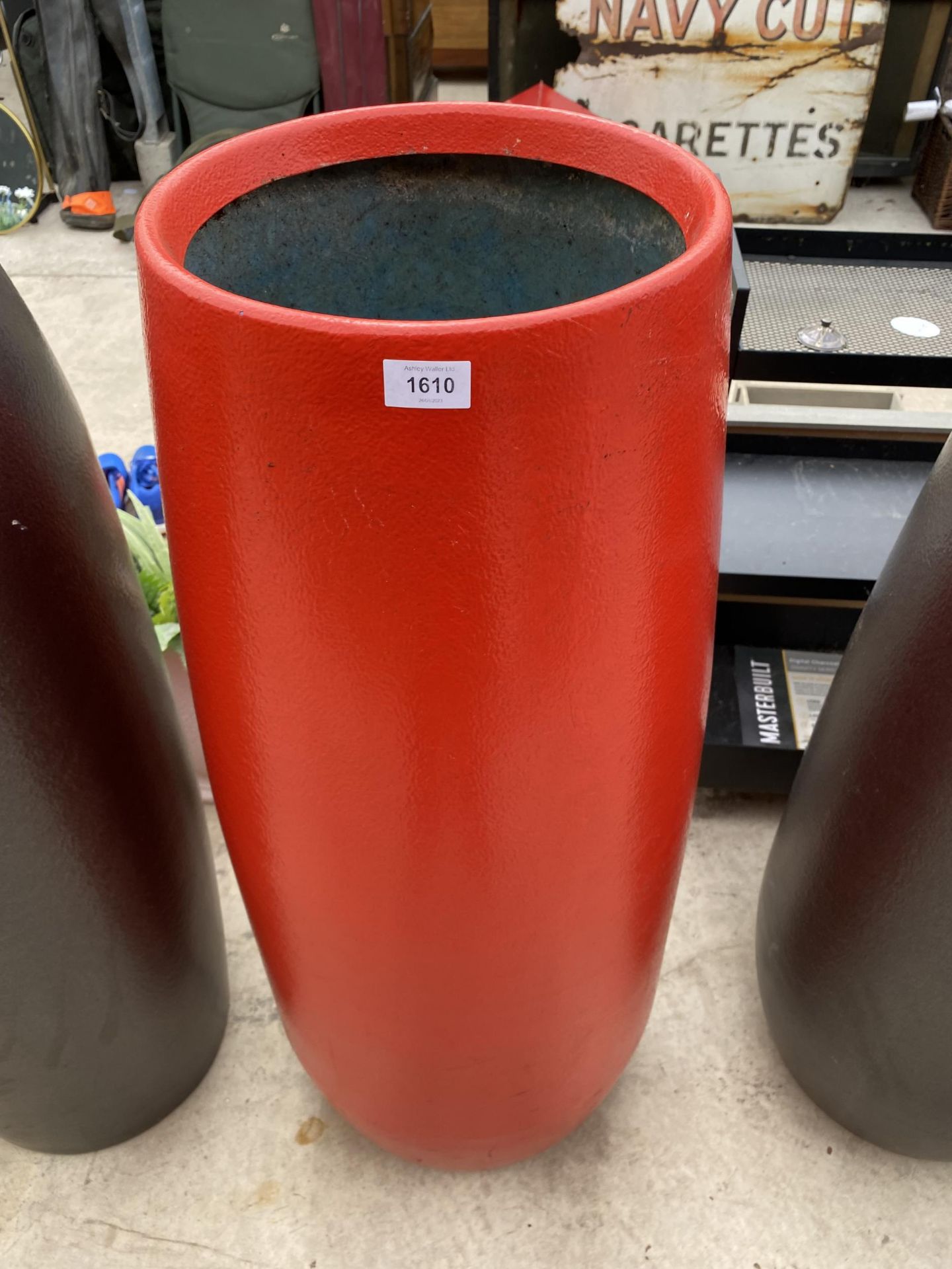 A TALL RED FIBRE GLASS PLANTER (H:104CM)