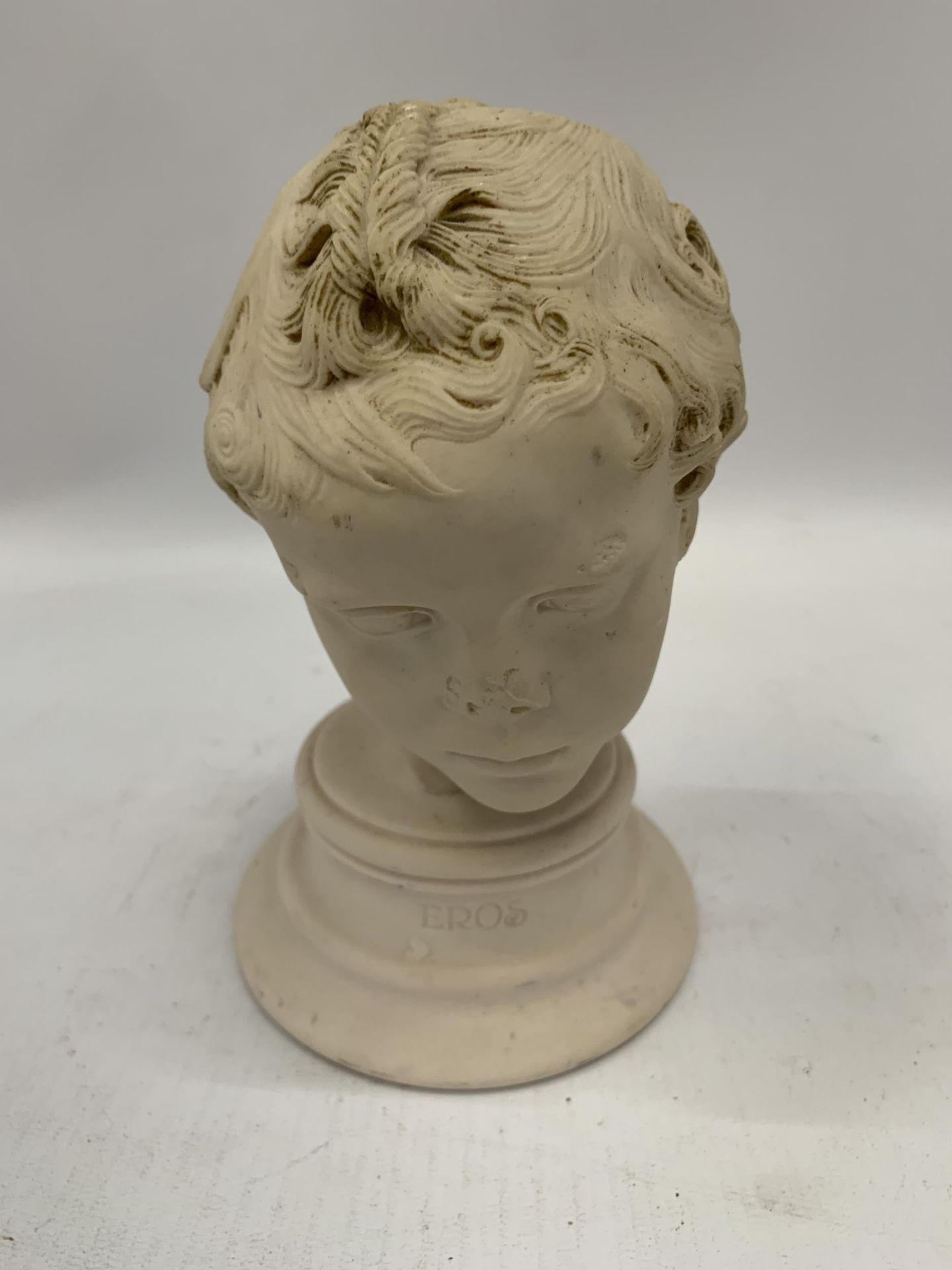 AN EROS BUST OF A BOY