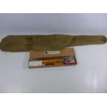 A CANVAS SLIP CASE FOR A 1942 MARK III SNIPERS RIFLE AND A WEBLEY UNUSED GUN CLEANING KIT (2)