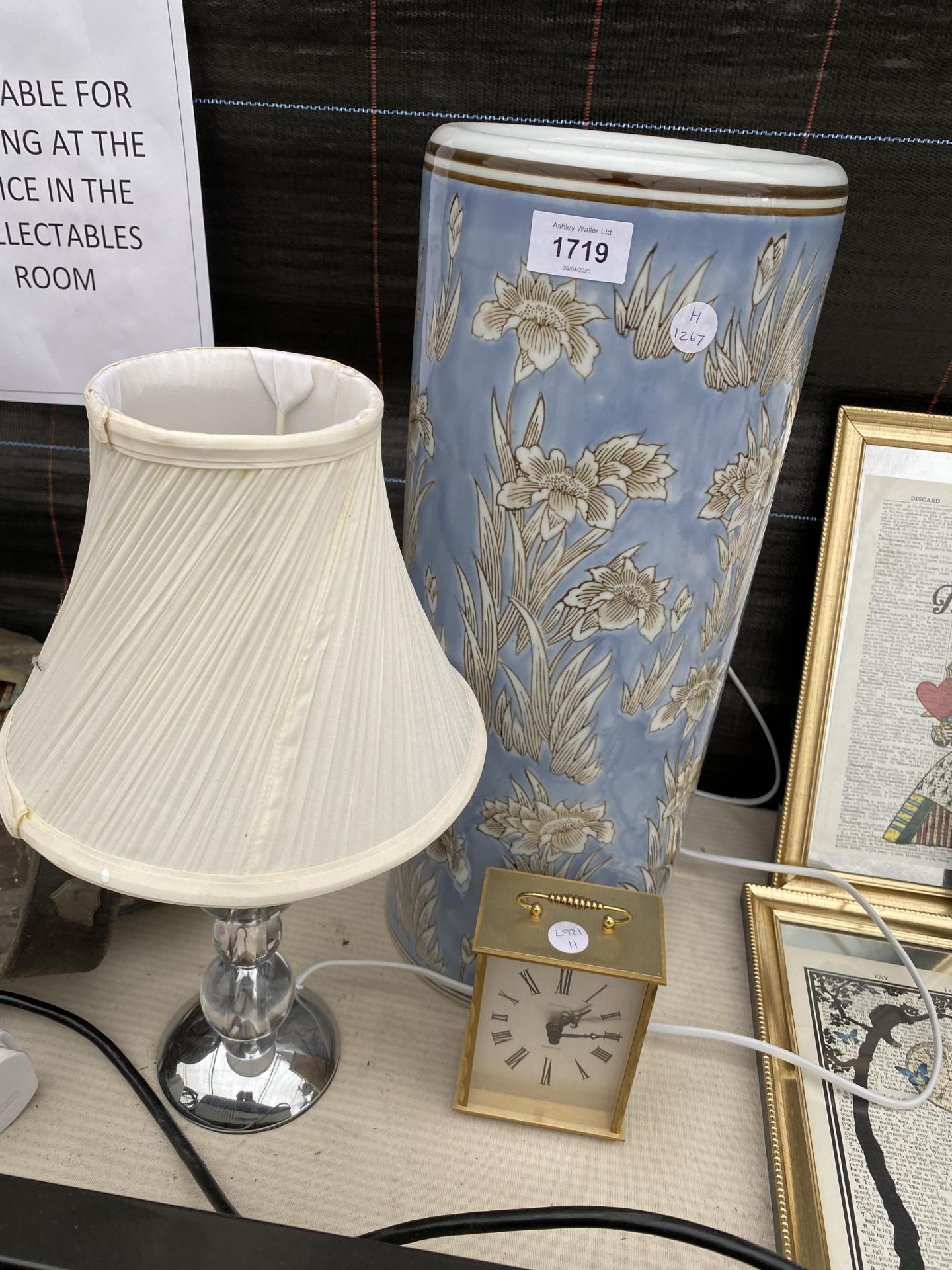 A CERAMIC STICK STAND, A LAMP AND A CLOCK ETC