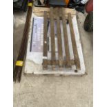 A QUANTITY OF ROAD STAKES, A MECHANICS TROLLEY AND A PASTING TABLE