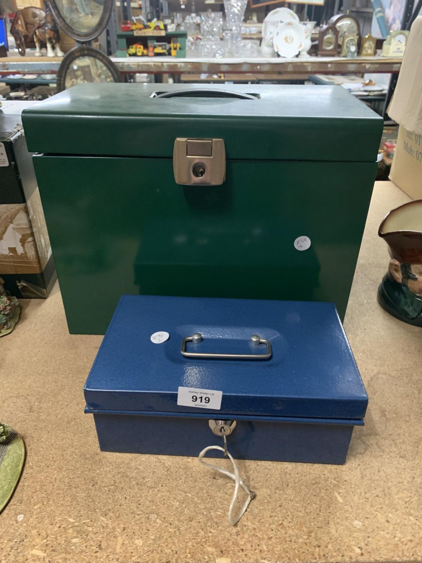 A LARGE METAL FILING BOX AND A SMALLER CASH BOX